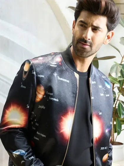 Another view of the celestial satin bomber jacket, perfect for the man who wants his style to be out of this world. The vibrant graphics are a true conversation starter.