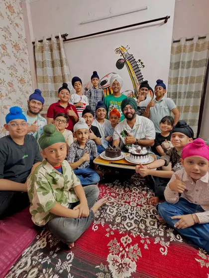 This picture says it all. My students are my family. Here we are celebrating my birthday at the academy, surrounded by smiles, cake, and of course, the sound of tabla. This is the community spirit we build in our classes.