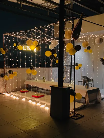 This angle shows how the light canopy creates an enclosed, intimate feel for the party.