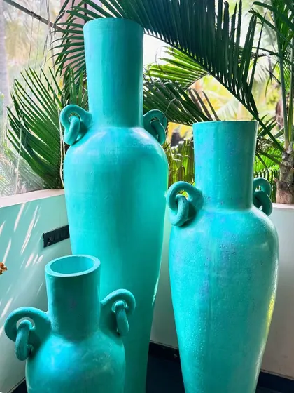 A closer look at the elegant shape and unique looped handles of the 'Del Mar' vases.