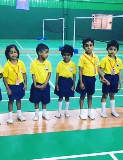 A lineup of our junior players, eager to start their badminton session. I welcome children of all skill levels to my camps, from complete beginners to those with some experience.