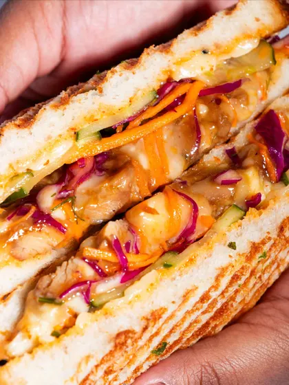 An even tighter shot of the Togarashi Chicken Melt's juicy filling.
