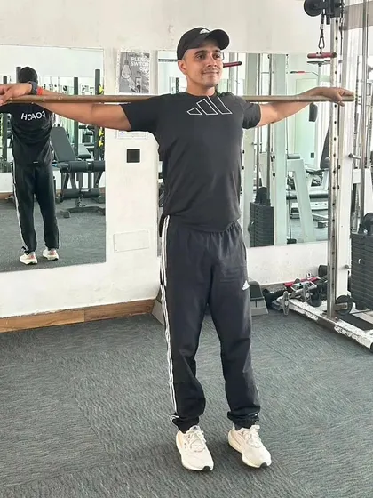Stick exercises are great for improving posture and flexibility.