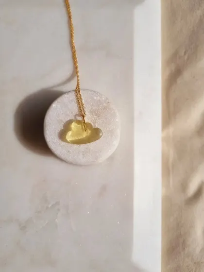 My 'megh' Lemon Quartz cloud pendant is designed to reduce anxiety and bring calm. It's a wonderful stone for focus and concentration.