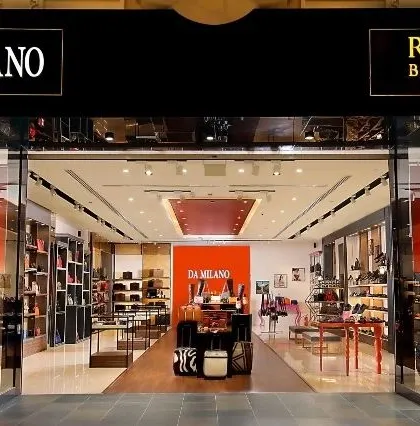 The wide, open storefront for a Da Milano store, designed to be completely transparent and inviting, showcasing the entire store as a display window.