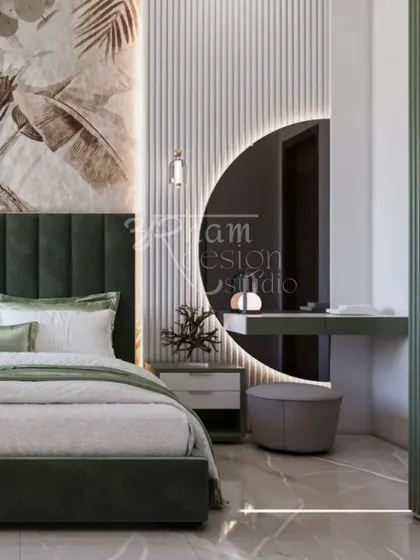 For this master bedroom, I used a soothing green palette and soft textures to create a personal retreat. The custom-designed dressing area with the circular mirror adds a touch of modern elegance and functionality.