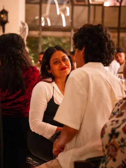 An intimate moment shared between guests on New Year's Eve. My mansion provides the perfect setting for both grand celebrations and personal connections.
