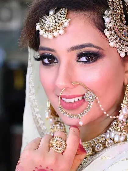 A bright and happy bridal portrait, where the bride's beautiful smile is the best accessory.