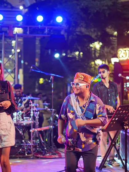 That smile says it all. There's no better feeling than being on stage with my band, sharing our music and creating a beautiful experience together.