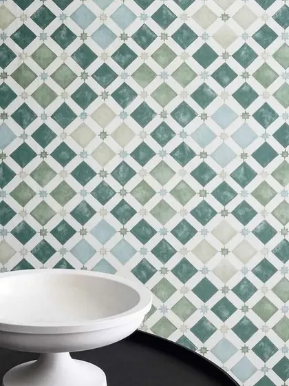 We like our greens sojourned on a wall. This geometric tile-patterned wallpaper in shades of green and white offers a fresh, clean, and modern aesthetic, perfect for a bright and airy room.