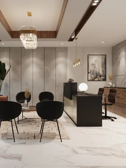 Another angle of the CA Office reception. This view shows the comfortable leather sofa for visitors and the large window that fills the space with natural light, offering a view of the city.