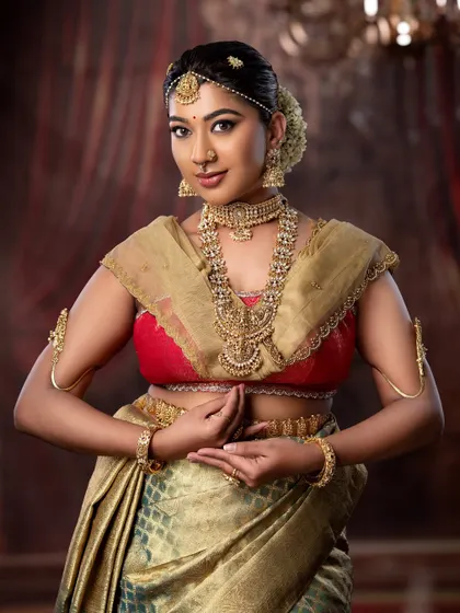 A confident pose from the bride, showcasing her complete look. I work to ensure the makeup lasts all day, from the ceremony to the reception.