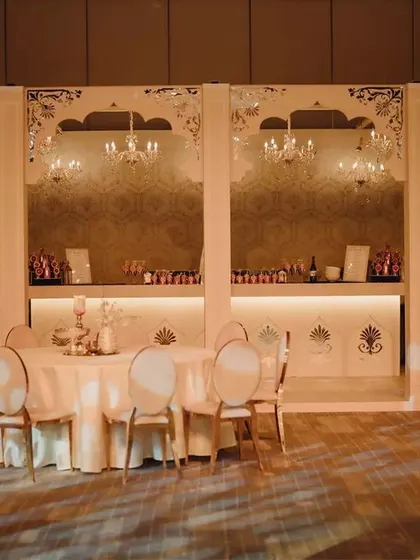 This was more than just a bar; it was an imperial experience. We designed a grand, walk-in bar that became a central feature of the event, framed by regal arches and elegant chandeliers.