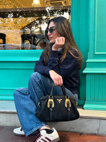 Another angle of my winter cafe outfit, showing my Prada bag.