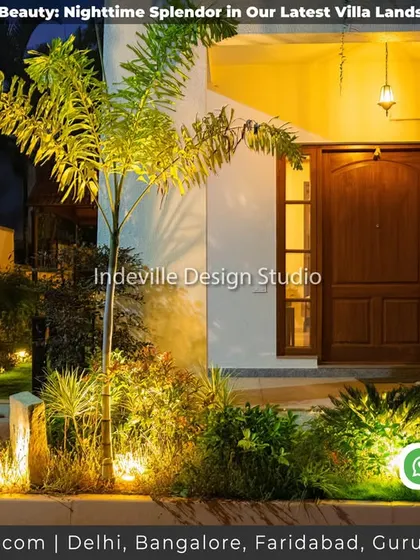 A duplicate image of the beautifully lit villa entrance.
