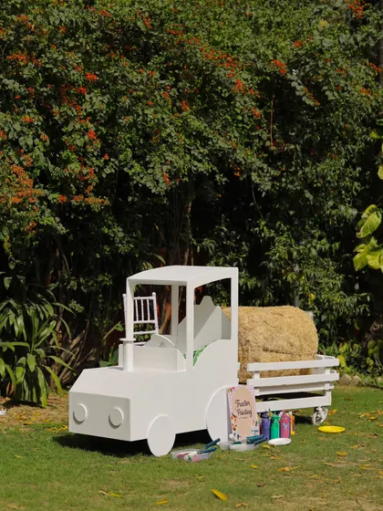The tractor activity station, a perfect example of how we integrate entertainment seamlessly into our event design.
