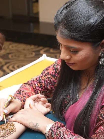 A close-up of me demonstrating a design during a seminar.