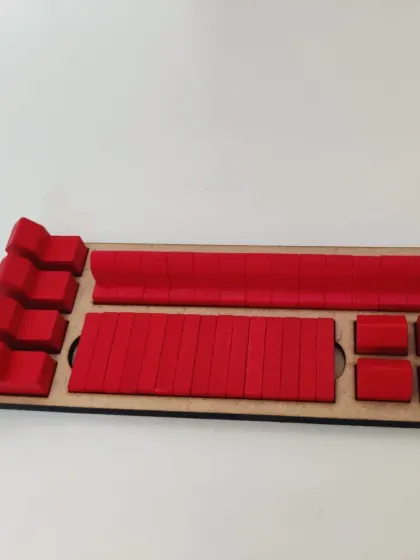 This custom stand for Catan board game pieces was made by a PCL Pass member using our laser cutter.