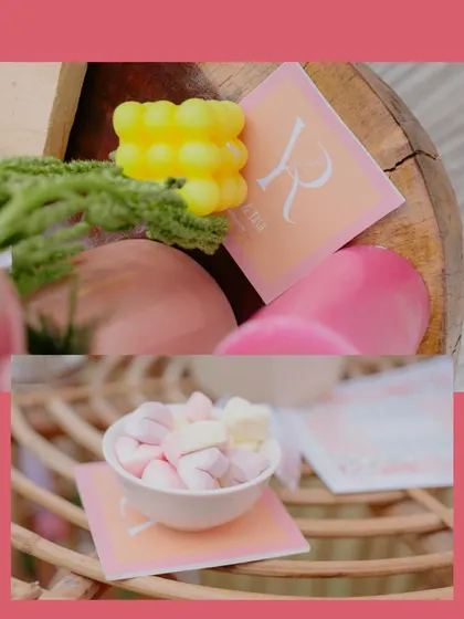 A collage of personalized details, including custom coasters with the couple's monogram and sweet treats for guests to enjoy.