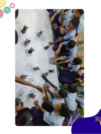 A top-down view of our scribbling bot race, designed to be accessible and fun for students with hearing impairments, proving that curiosity has no barriers.