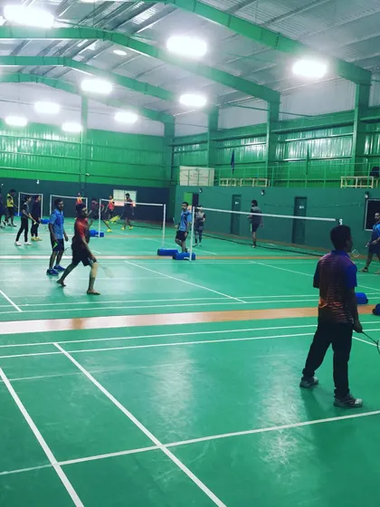 Another perspective of the courts during a corporate event, showing players of all skill levels enjoying the game. My events are designed to be inclusive and fun for everyone.