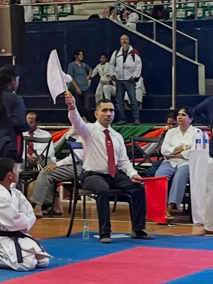 Serving as a corner judge at a karate tournament. My JKA certification qualifies me to officiate at competitions, ensuring that matches are judged fairly and according to official rules.