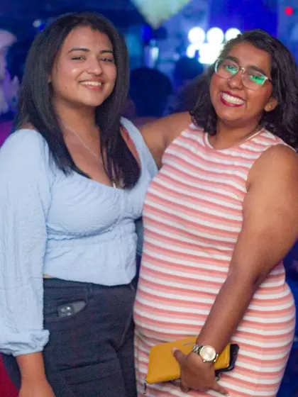 Two friends smiling for the camera. It's a place to make new friends and create lasting memories.