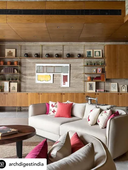 The first-floor lounge of the K Residence, featured in Architectural Digest, showcases our ability to blend comfort with high design. The custom shelving and cabinetry provide a backdrop for art and objects, while the curved sofa adds a soft, inviting touch to the room.