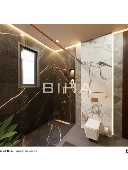 This perspective of the master washroom highlights the walk-in shower area, fully clad in dramatic black marble. We incorporated rose gold fixtures and a small window for natural light, balancing the dark, luxurious materials with warm metallic accents and daylight.