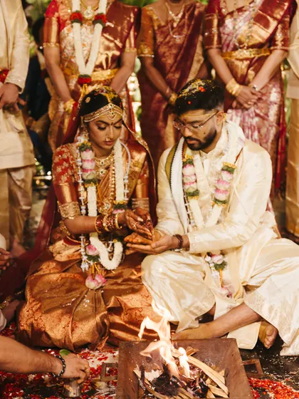 The sacred fire or 'Agni' is a central part of the Hindu wedding ceremony. We ensure the setup for these rituals is both beautiful and functional, allowing the priest and the couple to perform the rites with ease.