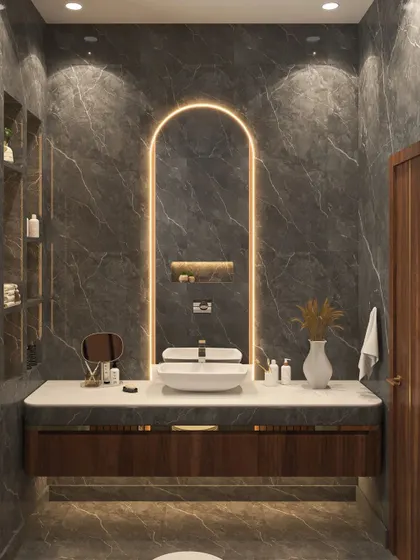 The floating vanity with a vessel sink and an arched, backlit mirror maximizes floor space and adds a contemporary touch.