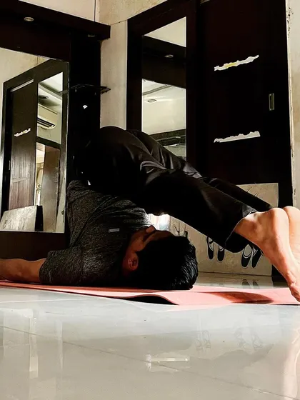 The Plow Pose, or Halasana, is an excellent stretch for the back and shoulders. Here I am demonstrating the full expression of the pose.