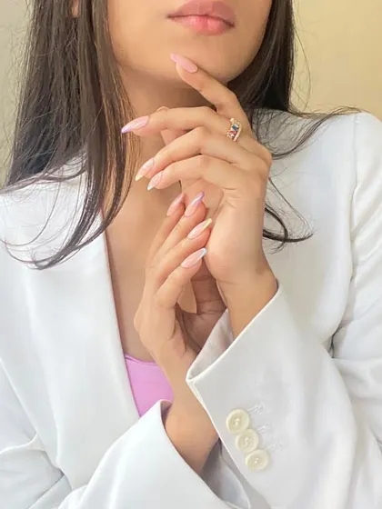 A full view of the pastel-tipped French manicure, demonstrating how these custom press-on nails provide a flawless and elegant finish to any look.