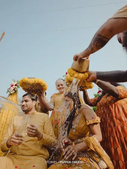 A wide shot of Medhus and Adi's Haldi ceremony, showing the involvement of all the friends and family. It truly captures the spirit of a community celebration.