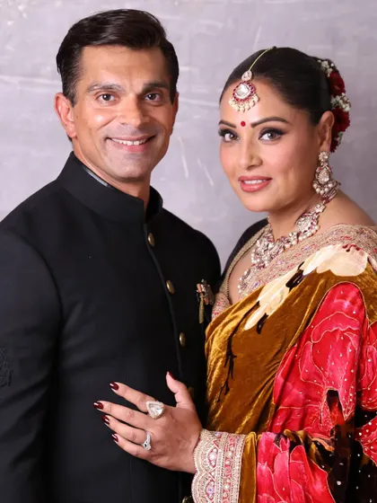 The happy couple, Bipasha and Karan, posing together. Their smiles show the easy comfort and love they share, which is what I always strive to capture.
