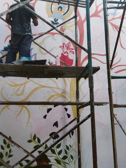 The initial stages of the Kalamkari mural, with the outlines just beginning to be filled in. This is where the story starts.