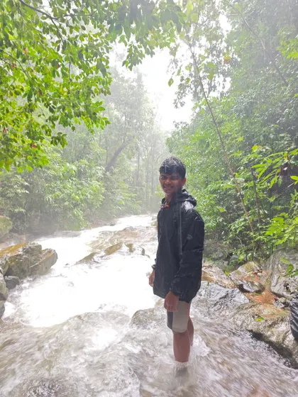 Wading through a river during our Sharavathi Valley trek. It's a refreshing and adventurous part of the journey to reach hidden waterfalls.