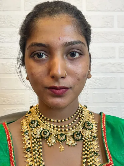 The 'before' shot for our Maharashtrian bridal demonstration. We always start with a clean, prepped face to ensure the best results.