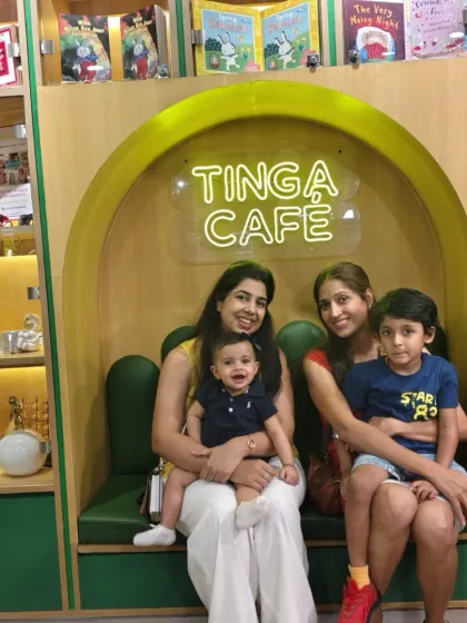Two families enjoy some downtime at the Tinga Cafe. It's a great spot for parents to relax and chat while the little ones are either playing or enjoying a snack.
