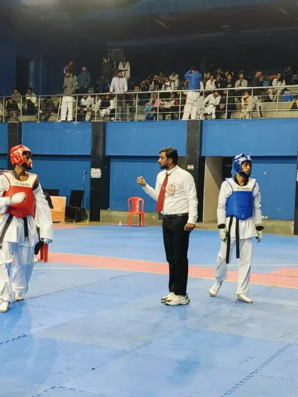Keeping a close eye on the match. As a referee, my focus is on the safety of the players and the fairness of the competition.