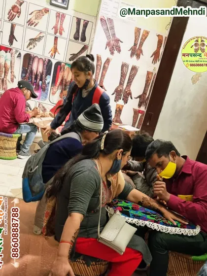 Our artists at work during a busy festival season. We can handle large groups and ensure everyone gets a beautiful design in a timely manner.