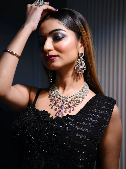 A close-up of the smokey eye, showing the blend of dark shadows and shimmer. This is a classic look that never goes out of style.