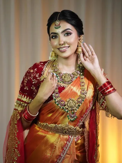 A happy bride is the most beautiful bride. This classic muhurtham saree is designed to make you feel confident and radiant as you step into your new life.