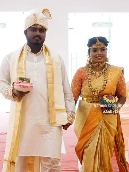 A duplicate of image 110, capturing the couple's traditional wedding look.
