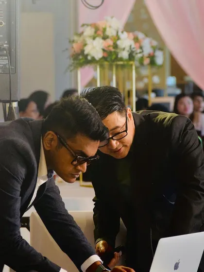 A closer look at a song request session during a wedding. I use a MacBook Pro with professional DJ software to manage my music library and deliver a seamless mix.