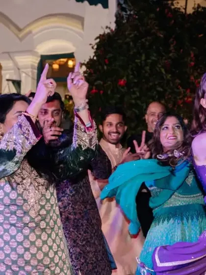 More happy faces and dance moves from the Sangeet party, showing the success of a well-planned celebration.