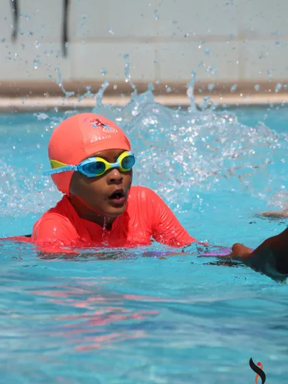 Action shots of our students practicing their strokes. Whether it's using a kickboard or working on breathing, every lap is a step forward.