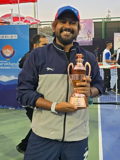 Our founder Suraj Bikkannavar proudly holding the team trophy after Karnataka's successful campaign at the 38th National Games.