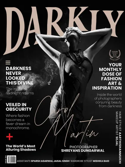 This black and white cover for Darkly Magazine captures a different mood. It's about sculpting with shadows and light to create a dramatic, statuesque form. This is where photography becomes a poetic interplay of shadow and form.