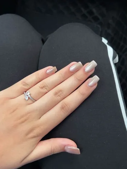 A casual shot of the nude cat eye nails, perfect for everyday wear.